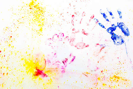 Diversity and friendship portrayed by two colored handprints over white backgroundの写真素材