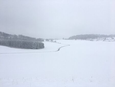 A road in the snow in Albstadt on the Swabian Albの写真素材