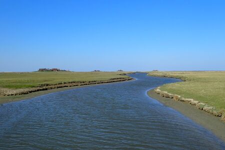 Hallig Hooge is situated in the North sea and consists of tidal creeks and marshland.の写真素材