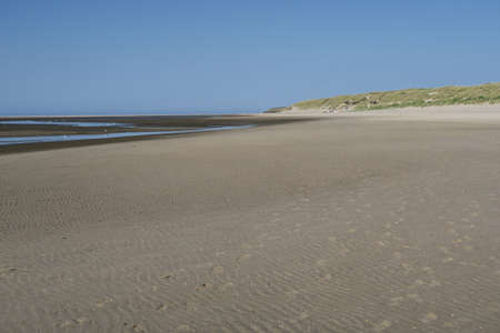 Panorama of the beach at low tide on the German North Sea island Langeoogの写真素材