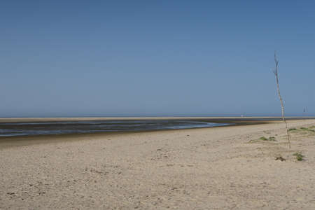 An empty beach on Langeoog. The island in the German North Sea is part of the national park wadden sea.の写真素材