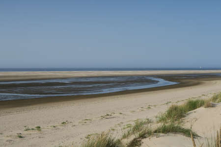 Panorama of the beach at low tide on the German North Sea island Langeoogの写真素材