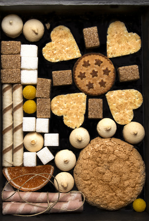Different cookies in a black boxの写真素材