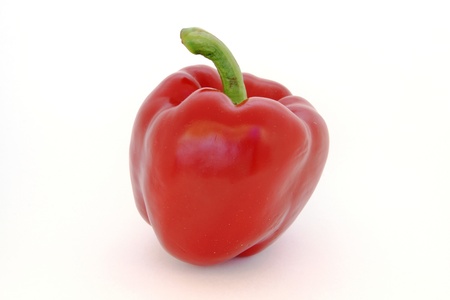 Pepper red with a green tail, ripe on a white backgroundの写真素材