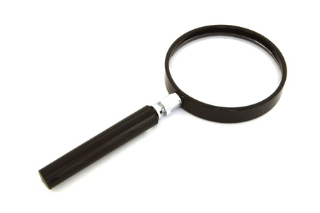 Magnifying glass in a round frame with the black handle on a white backgroundの写真素材