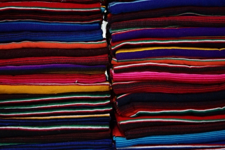 Woven rugs with color strips are piledの写真素材