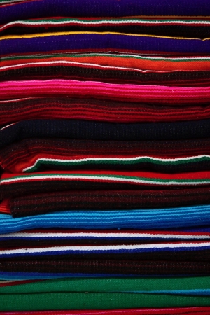 Woven rugs with color strips are piledの写真素材