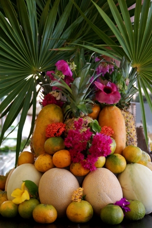 The allsorts from orange, tangerine, melons, pineapple also are decorated with flowersの写真素材