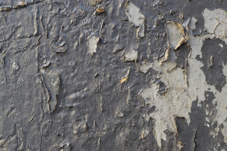 Gray concrete walls with the damaged plaster and the spoiled surfaceの写真素材