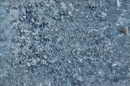 Old road surface after removal of an asphalt coveringの写真素材