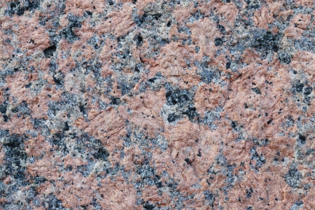 Structure of an old granite wall for a background and a surfaceの写真素材