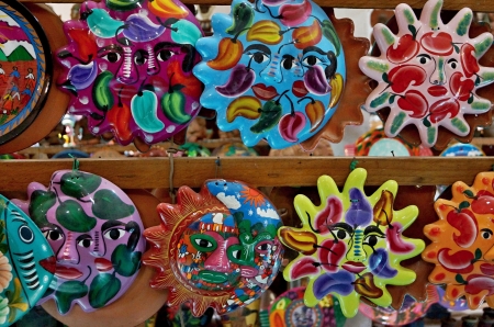 Figurines and masks of Indian tribes are made of ceramics and decorated with various symbols, signs and drawingsの写真素材