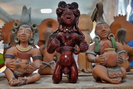 Figurines and masks of Indian tribes are made of ceramics and decorated with various symbols, signs and drawingsの写真素材