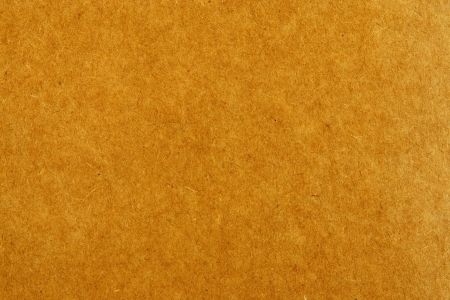 Texture of a cardboard of brown color for a background and a surfaceの写真素材