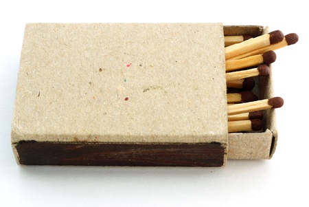 Wooden matches in an open old cardboard boxの写真素材