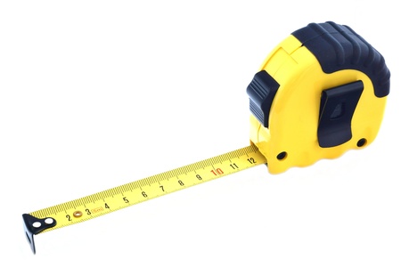 Yellow roulette for length measurement on a white backgroundの写真素材