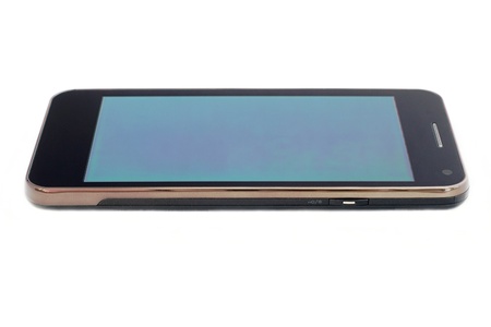 The cell phone is located horizontally on a white backgroundの写真素材