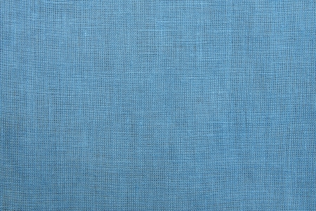 Texture of linen fabric of pale color for a background and a surfaceの写真素材