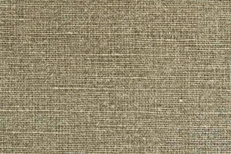 Texture of fabric of brown color from flax for a background and a surfaceの写真素材