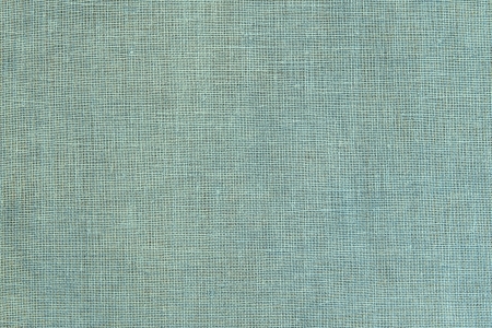Texture of linen fabric of pale color for a background and a surfaceの写真素材