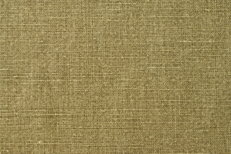 Texture of fabric of brown color from flax for a background and a surfaceの写真素材
