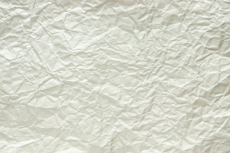The crumpled sheet of paper of white color for a background and an abstract surface, for the textの写真素材