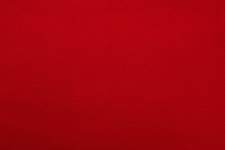 Ckarlet texture of fabric from a textile material for an abstract background, for an empty surface and for wall-paperの写真素材