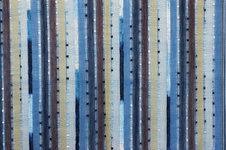 Structure of mesh fabric for a background, points and vertical strips of various colorの写真素材