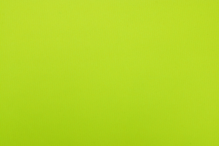 Flavovirent texture of fabric from a textile material for an abstract background, for an empty surface and for wall-paperの写真素材