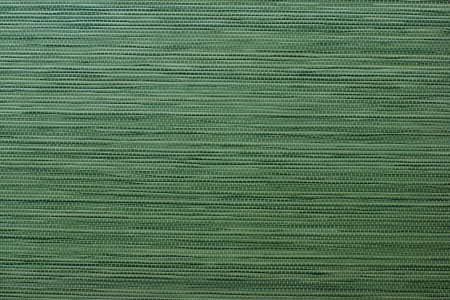 Green texture from a straw mat with horizontal weaving, for a background, for a surface, for wall-paperの写真素材
