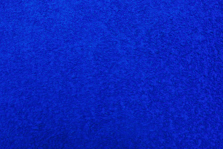 Blue texture of terry fabric for a background, for a surface, for wall-paper