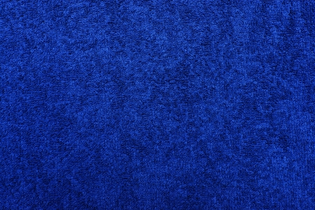 Blue texture of terry fabric for a background, for a surface, for wall-paperの写真素材