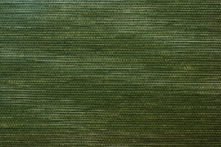 Green texture from a straw mat with horizontal weaving, for a background, for a surface, for wall-paperの写真素材