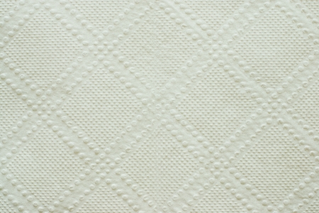 Texture of a white paper napkin for an abstract background with a patternの写真素材