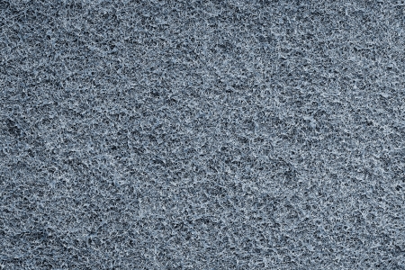 Abstract texture of a gray synthetic filtering material for wallpaper and backgroundsの写真素材