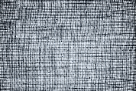 Texture of dense gray fabric closeup against bright light of a white lamp for abstract backgrounds and wallpaperの写真素材