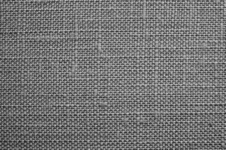 Texture of rough dense fabric for a gray background and abstract wallpaper, a closeupの写真素材