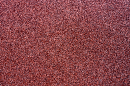 Fine-grained texture of a red abrasive material for wallpaper and for abstract backgroundsの写真素材