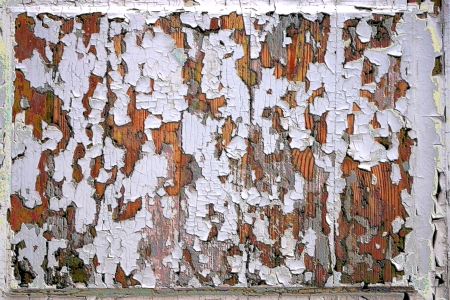 Abstract texture of white enamel paint on an old wooden boardの写真素材