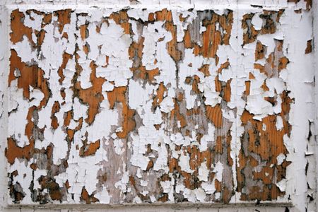 Abstract texture with effect dabs of a brush white oil paint on old wooden boardsの写真素材