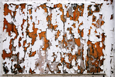 Texture of the peeled-off old paint on a wooden surface for abstract backgroundsの写真素材