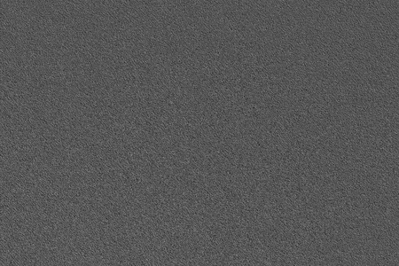 The black textured surface of artificial fabricの写真素材