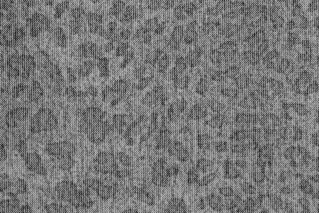 spotty texture of gray knitted fabric for abstract backgrounds and for wallpaperの写真素材