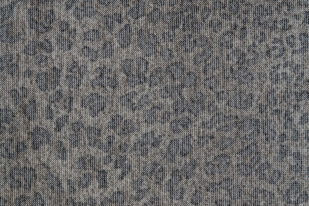 spotty texture of gray knitted fabric for abstract backgrounds and for wallpaperの写真素材