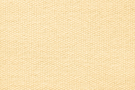 abstract background of light yellow coarse-grained texture of rough fabric with an interlacingの写真素材
