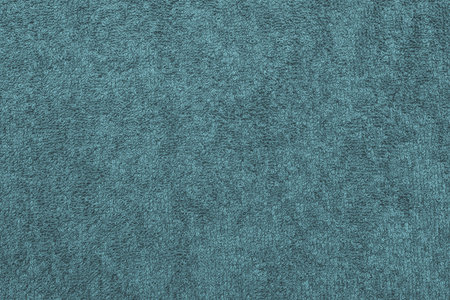 abstract texture terry cotton fabric closeup for a turquoise background