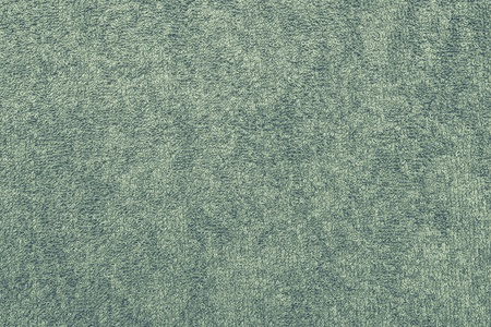 abstract texture terry cotton fabric closeup for a green backgroundの写真素材