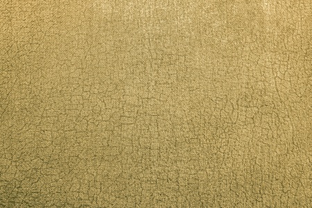abstract background from texture of old shabby yellow gray paper fabricの写真素材