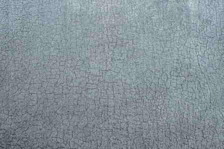 abstract background from texture of old shabby silvery paper fabricの写真素材