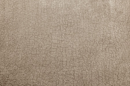 abstract background from texture of old shabby brown paper fabricの写真素材